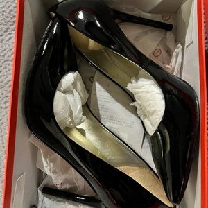Black patent pumps